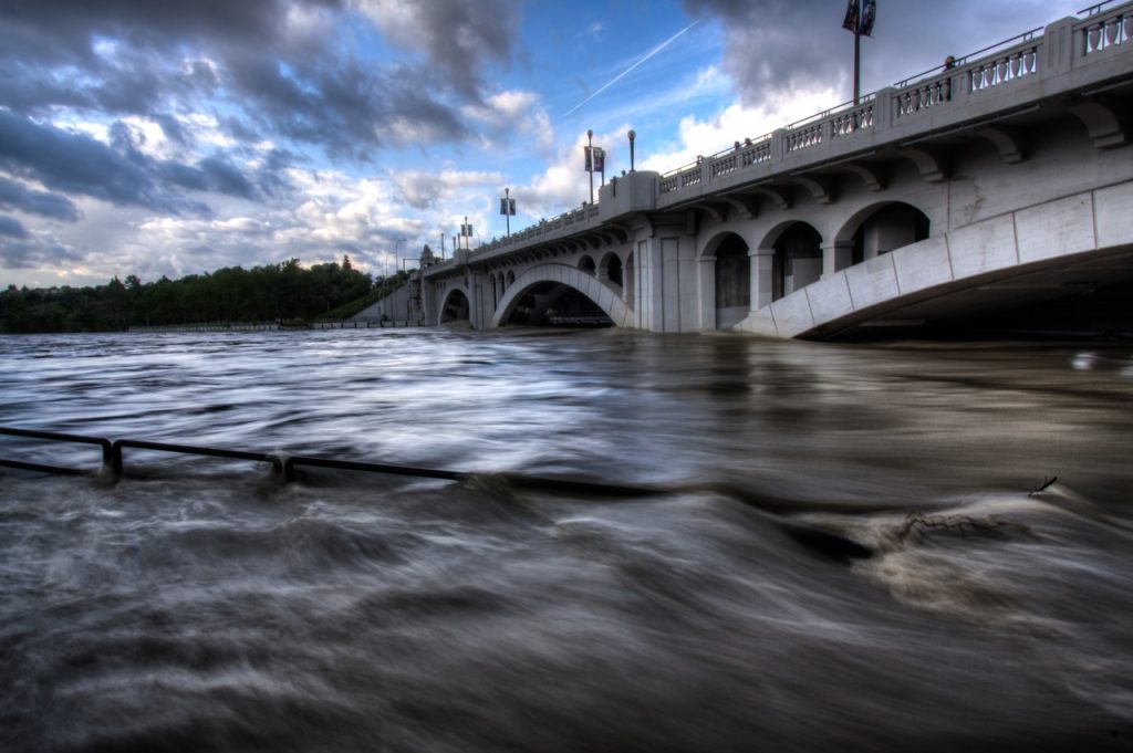 Bow river almost submerges Calgary's Centre Street Bridge during flood of 2013.